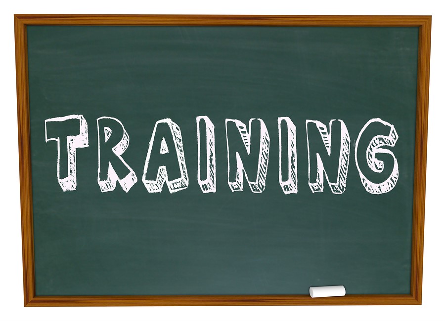 The word "training" written on a chalkboard