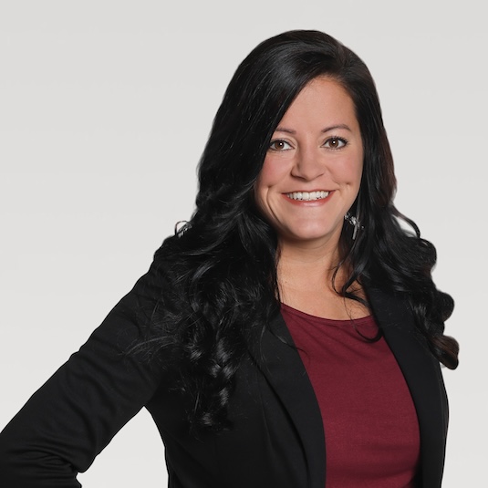 Woman in black hair smiling