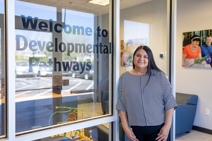 Woman at the front entrance of DP